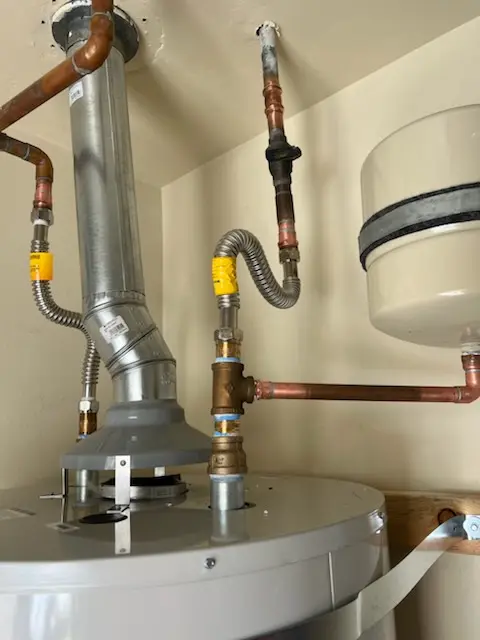Water heater installation and plumbing repair in Farmington Station