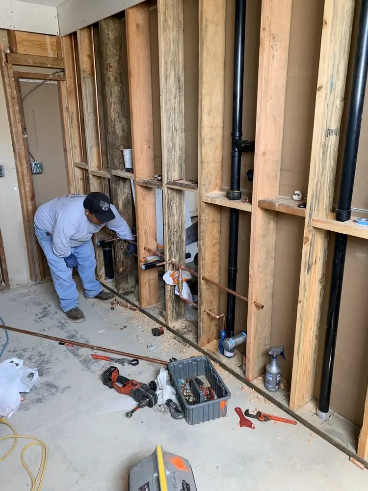 Commercial rough-in plumbing for Water Heater Replacement in Farmington Station